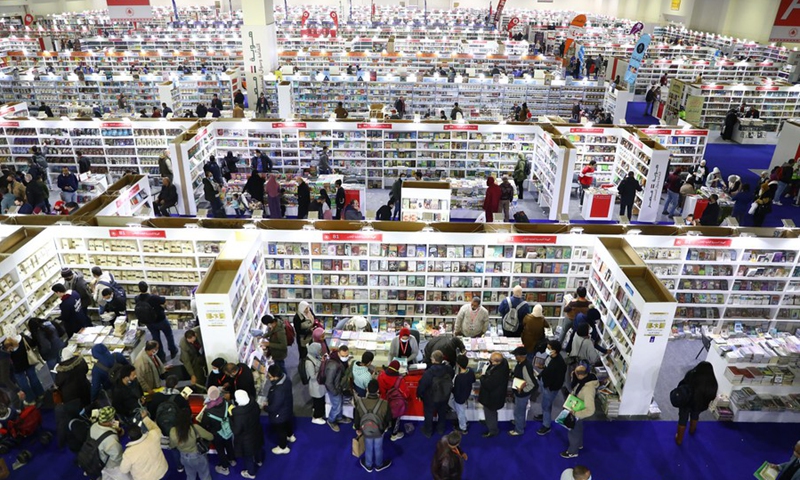 People visit the Cairo International Book Fair held in Cairo, Egypt, on Jan. 27, 2022.(Photo: Xinhua)