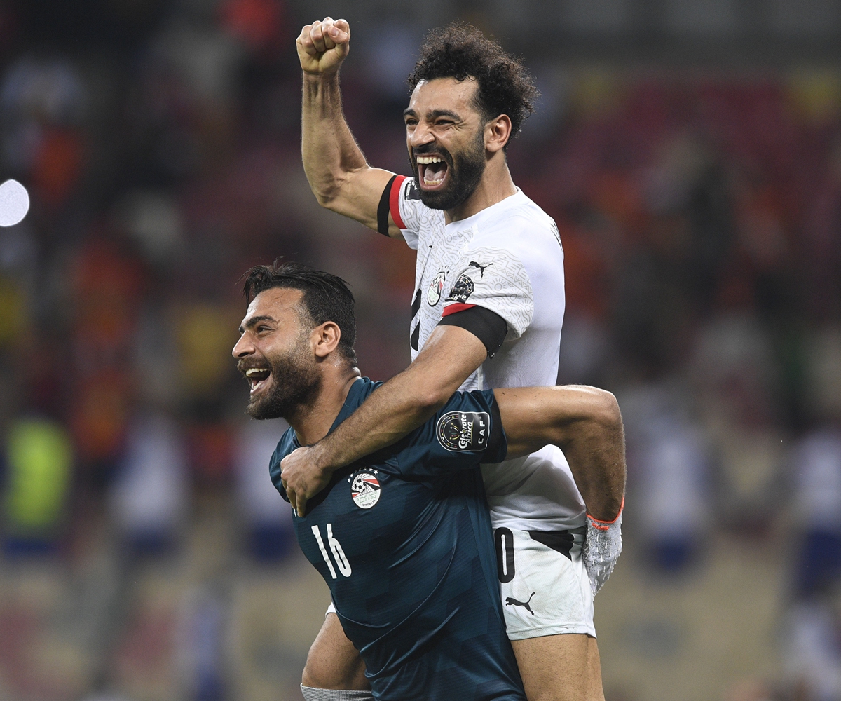 Mohamed Salah (top) of Egypt celebrates on  January 26, 2022 in Douala, Cameroon. Photo: VCG