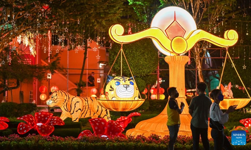 People visit a lantern fair in Jenjarom of Selongor, Malaysia, Jan. 28, 2022. Themed with tiger, the lantern fair will last till the 15th day of the first month of the upcoming Chinese Lunar New Year, the year of the Tiger.(Photo: Xinhua)