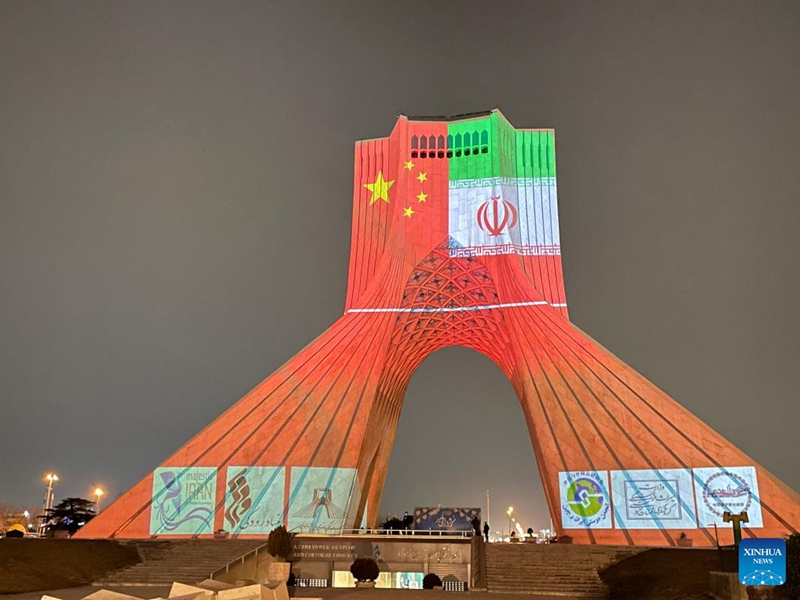 The Azadi Tower is illuminated to mark the Chinese Lunar New Year in Tehran, Iran, on Jan. 31, 2022. The iconic Azadi Tower in Tehran flashed red on Monday, a color associated with good luck and happiness in China, to mark the Chinese Lunar New Year, or Spring Festival, which falls on Feb. 1 this year. (Chinese Embassy in Iran/Handout via Xinhua)
