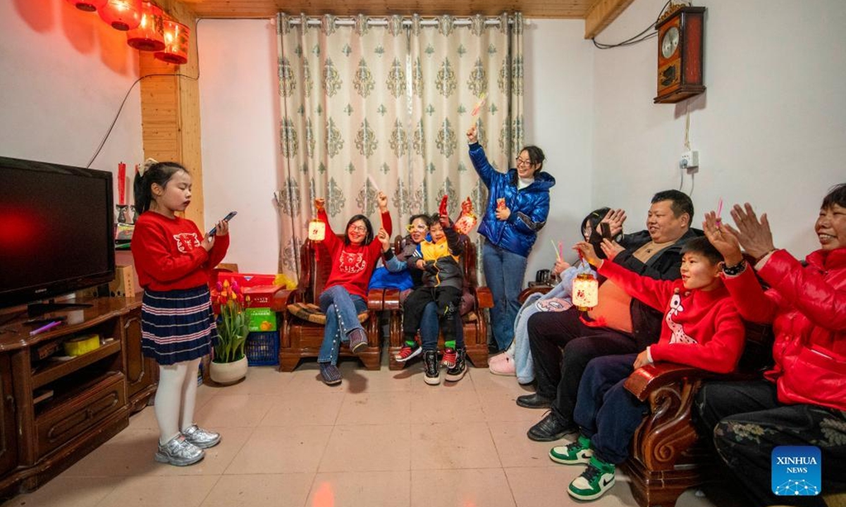Villagers stage performances to amuse themselves at a village in Huajie Town, Yongkang, east China's Zhejiang Province on Feb. 1, 2022. Various activities are held during the Spring Festival holidays. (Photo by Hu Xiaofei/Xinhua)