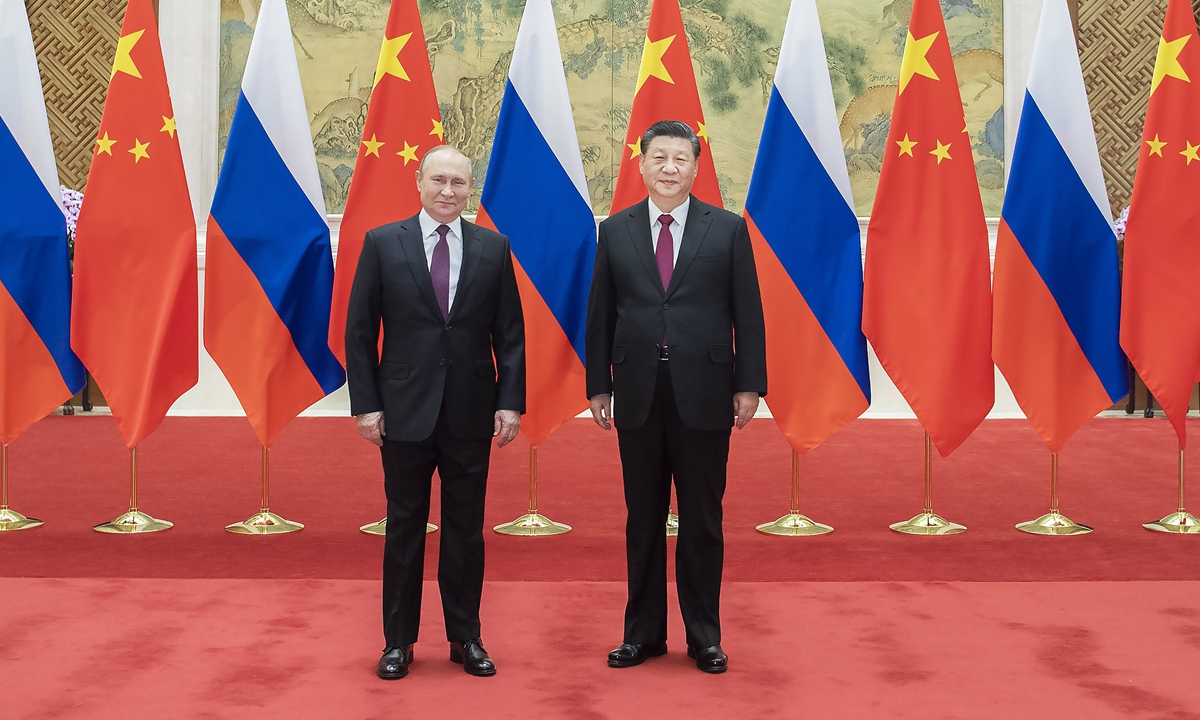 Chinese President Xi Jinping (right) meets and holds talks with visiting Russian President Vladimir Putin at the Diaoyutai State Guesthouse in Beijing on February 4, 2022. Photo: Xinhua