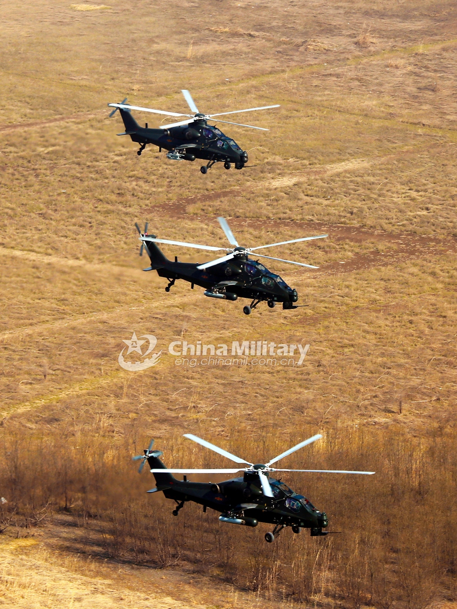 Helicopters attached to an army aviation brigade assigned to the PLA Eastern Theater Command fly in formation during a flight training exercise on January 19, which aims to hone the troops’ combat capabilities. (eng.chinamil.com.cn/Photo by Zhang Huanpeng)