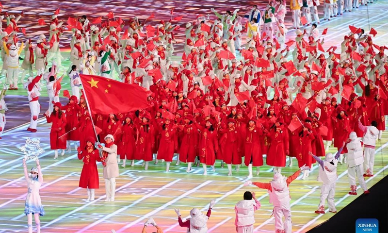 The Olympic delegation of the People's Republic of China parade into the National Stadium during the opening ceremony of the Beijing 2022 Olympic Winter Games in Beijing, capital of China, Feb. 4, 2022. (Xinhua)