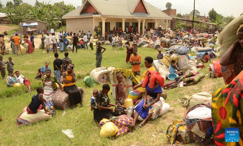 Congolese refugees rest at Busungu border post, Bundibugyo District, Western Region of Uganda, Feb. 3, 2022.Photo:Xinhua