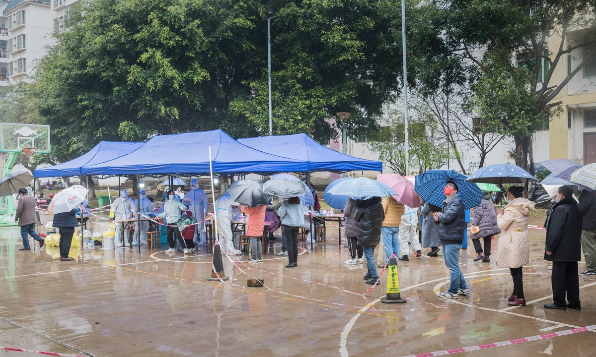 Residents line to take nucleic acid tests in Debao county, Baise, South China's Guangxi Zhuang Autonomous Region on February 6, 2022. Photo: VCG