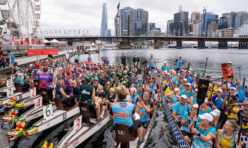 Dragon Boat teams are seen during the Dragon boat racing at Darling Harbour in Sydney, Australia, on Feb. 5, 2022.Photo:Xinhua