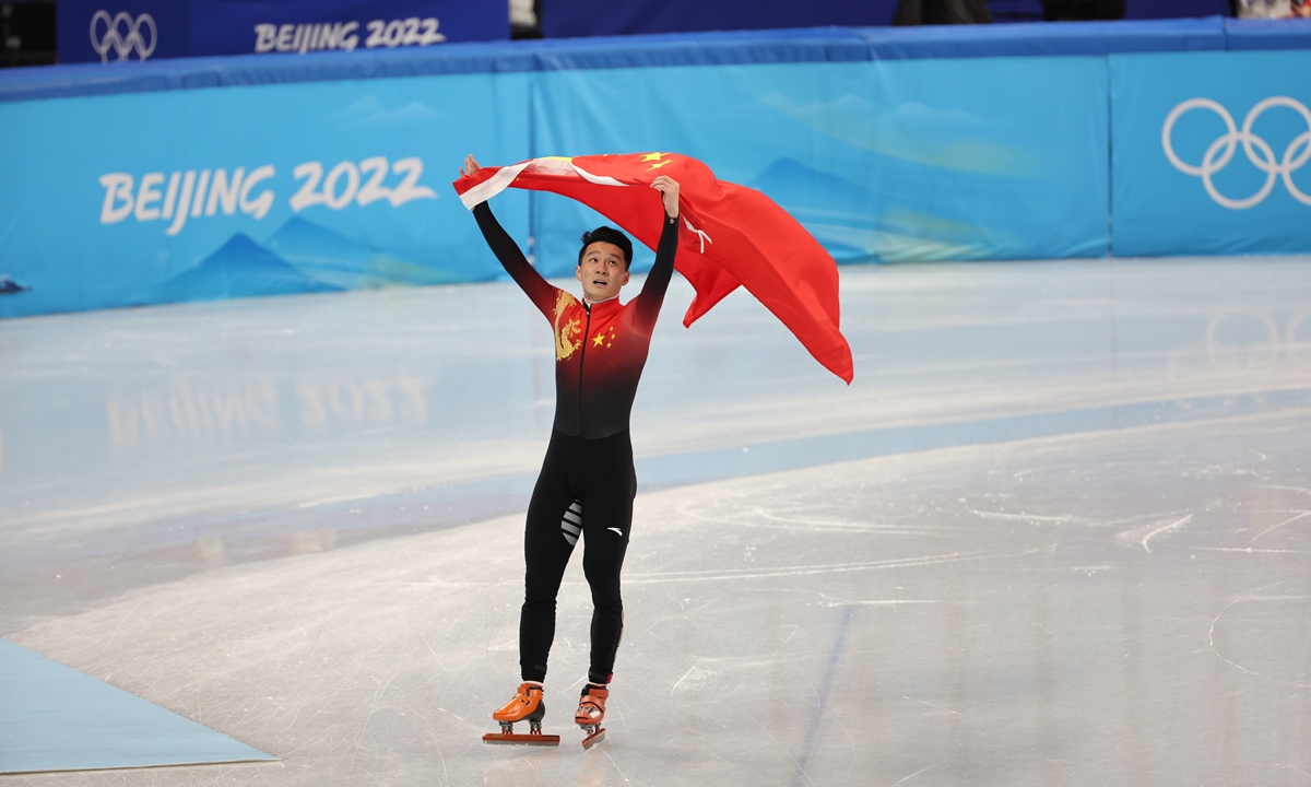 Short track speed skater Ren Ziwei celebrates winning gold in the men's 1,000 meters at the Beijing Winter Olympics on February 7.Photo: Li Hao/ Global Times