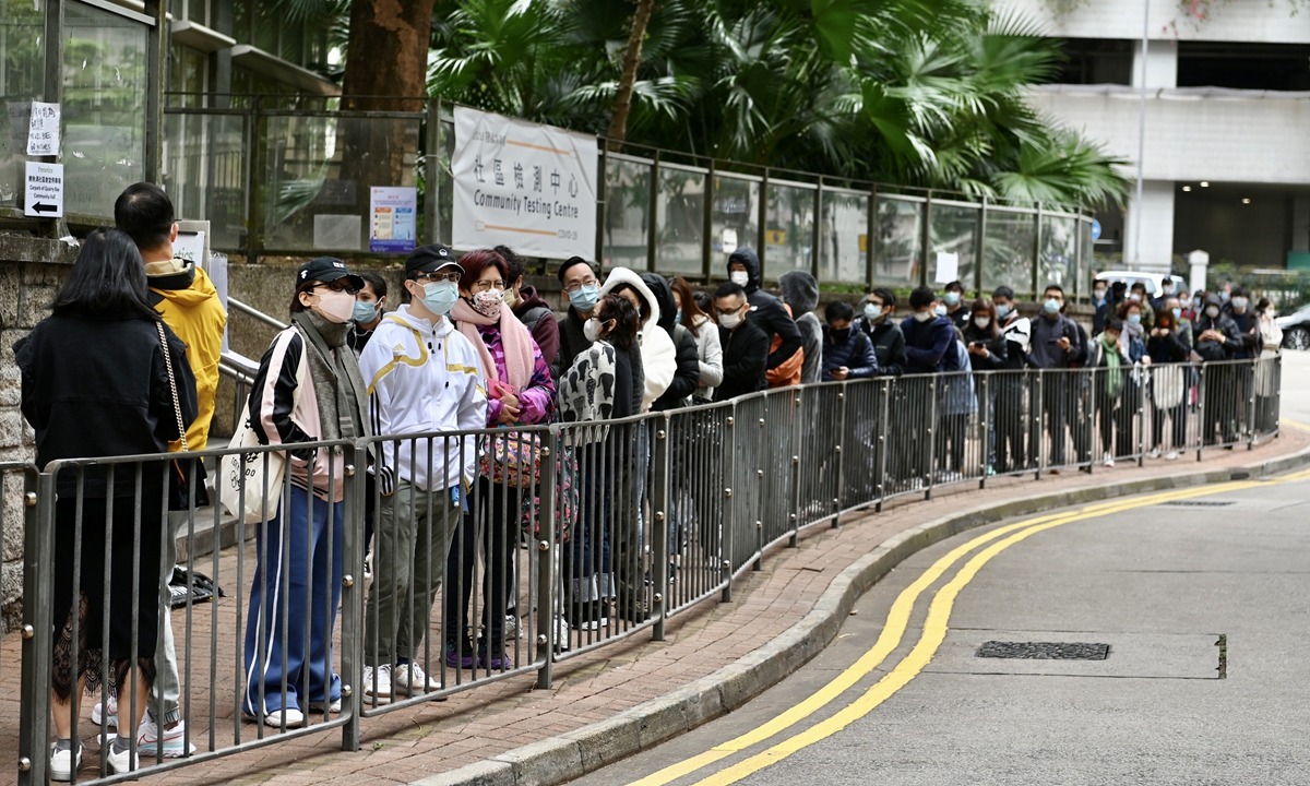 Hong Kong residents line up to take nucleic acid tests as the city battles an outbreak of the COVID-19 Omicron variant. Hong Kong confirmed 986 infections and registered another 800 primary positive cases on February 10, 2022. Photo: cnsphoto