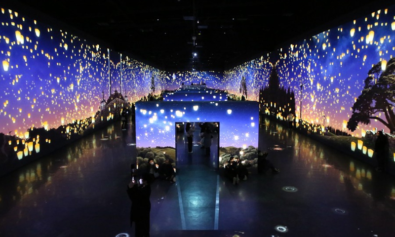 People visit an immersive multimedia art exhibition at Arte Museum in Gangneung, South Korea, Feb. 6, 2022. (Photo: Xinhua)