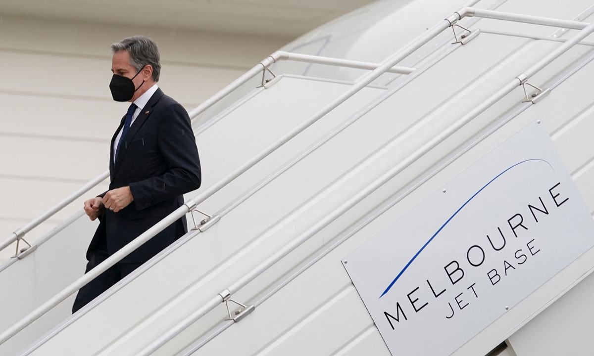US Secretary of State Antony Blinken steps from his plane upon arrival on February 9, 2022, to attend the Quad foreign ministers' meeting in Melbourne, Australia.