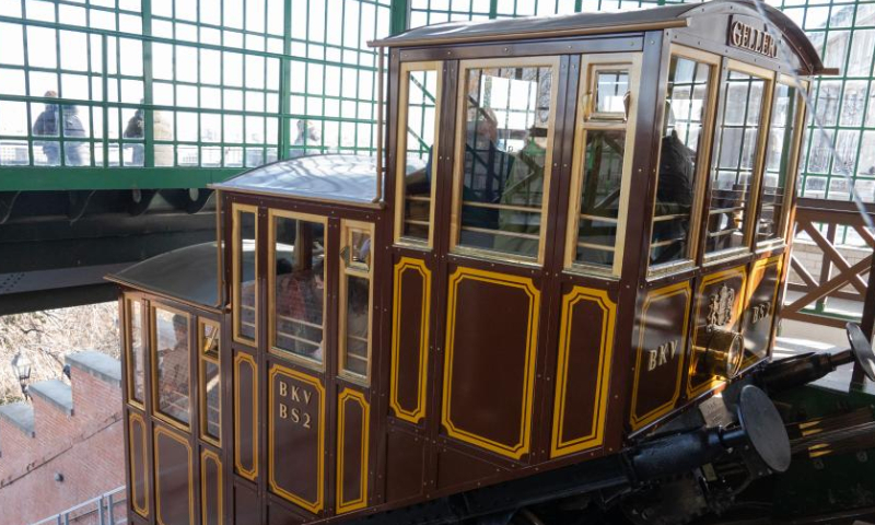 The 152-year-old Buda Castle Hill Funicular is seen as it restarts after a renovation in Budapest, Hungary on Feb. 8, 2022. The Buda Castle Hill Funicular, starting on March 2, 1870, is a tourist attraction of Budapest. After a big renovation, it reopened on Feb. 8. (Photo by Attila Volgyi/Xinhua)