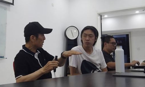 Zhang Yimou and Nuctopus Studio members Photo:Courtesy of Nuctopus Studio