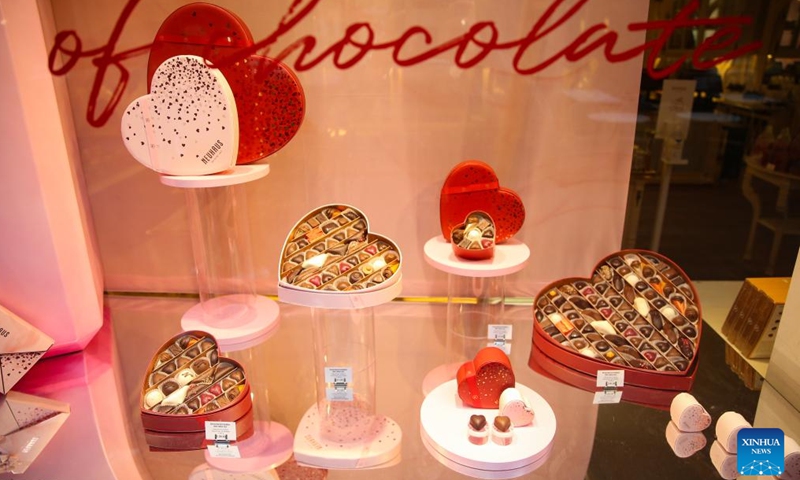 Chocolates in the theme of Valentine's Day are seen at a shop in Brussels, Belgium, Feb. 8, 2022. As the Valentine's Day approaches, new products by Belgian chocolate manufacturers have been put into market to attract shoppers.Photo:Xinhua