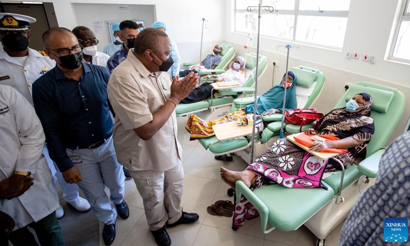 Kenyan President Uhuru Kenyatta (2nd L, Front) greets patients at a regional cancer center at the Coast General Teaching and Referral Hospital in Mombasa, Kenya, on Feb. 8, 2022.Photo:Xinhua