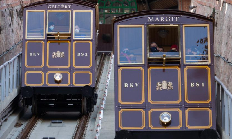 The 152-year-old Buda Castle Hill Funicular is seen as it restarts after a renovation in Budapest, Hungary on Feb. 8, 2022. The Buda Castle Hill Funicular, starting on March 2, 1870, is a tourist attraction of Budapest. After a big renovation, it reopened on Feb. 8. (Photo by Attila Volgyi/Xinhua)