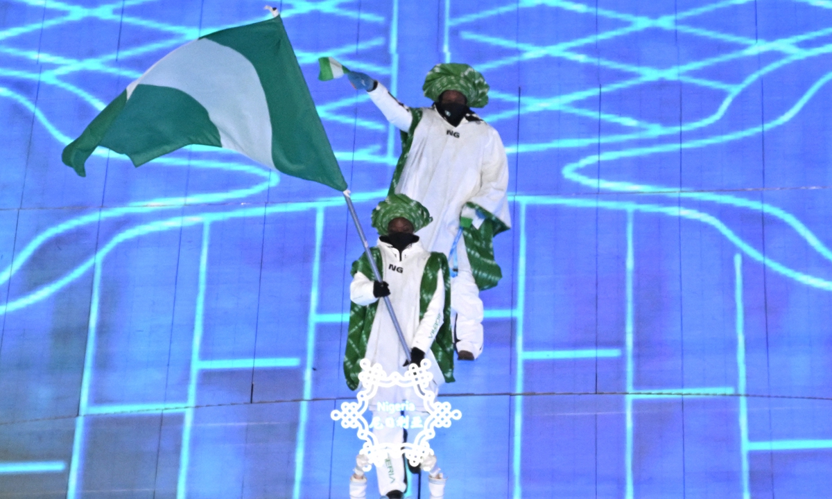 Nigeria's flag bearer leads the delegation as they enter the stadium during the opening ceremony of the Beijing 2022 Winter Olympic Games, at the National Stadium, known as the Bird's Nest, in Beijing, on February 4, 2022.Photo: AFP