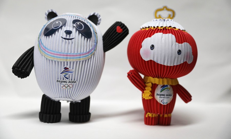 Photo taken on Feb. 10, 2022 shows mascots of Beijing 2022 Olympic Winter Games Bing Dwen Dwen and Beijing 2022 Paralympic Winter Games Shuey Rhon Rhon made of paper in Shenyang, capital of northeast China's Liaoning Province.(Photo: Xinhua)