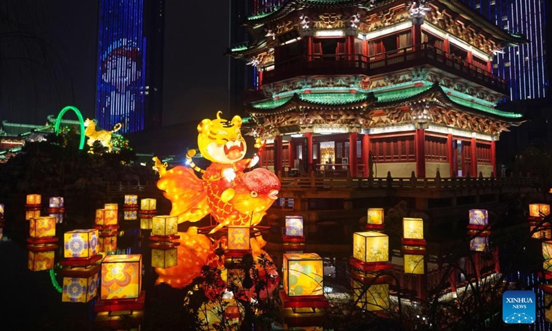 Photo taken on Feb. 12, 2022 shows the light installations for the upcoming Latern Festival at the Tengwang Pavilion scenic spot in Nanchang, capital of east China's Jiangxi Province. The Lantern Festival, the 15th day of the first month of the Chinese lunar calendar, falls on Feb. 15 this year, which features family reunions, feasts, light shows and various cultural activities. (Xinhua/Wan Xiang)