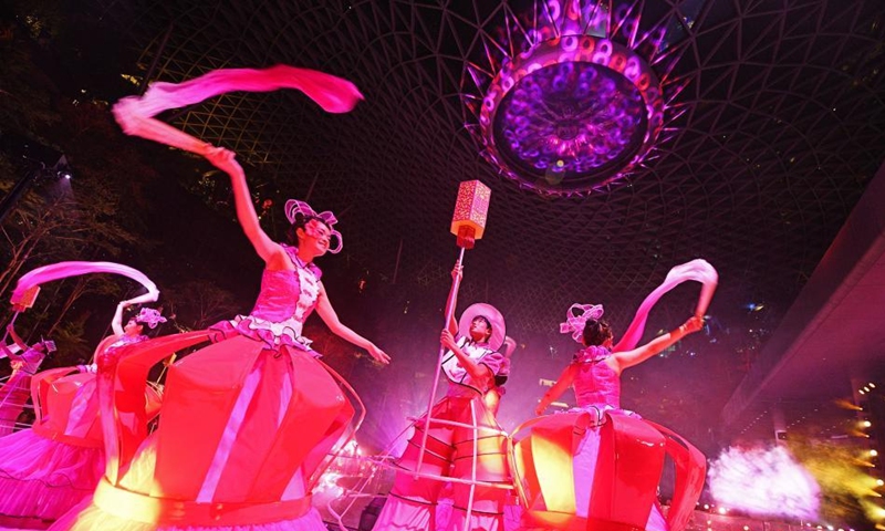 People perform at the Chingay Parade, as part of the Lunar New Year celebrations in Singapore's Jewel Changi on Feb. 12, 2022.Photo:Xinhua
