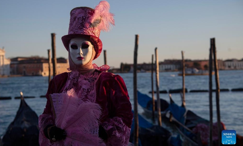 A reveler poses during the Venice Carnival in Venice, Italy, on Feb. 12, 2022.Photo:Xinhua