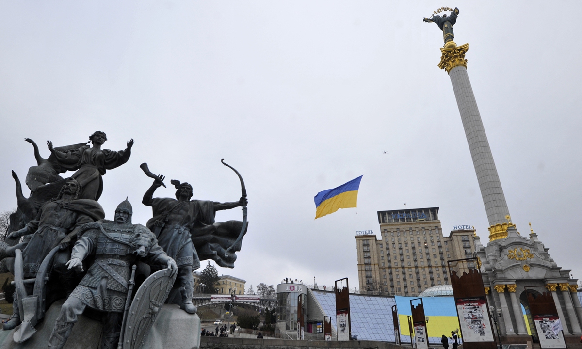 A drone carries a Ukrainian National flag above the Independence Square to mark a Day of Unity in Kyiv on Wednesday. Photo: AFP 