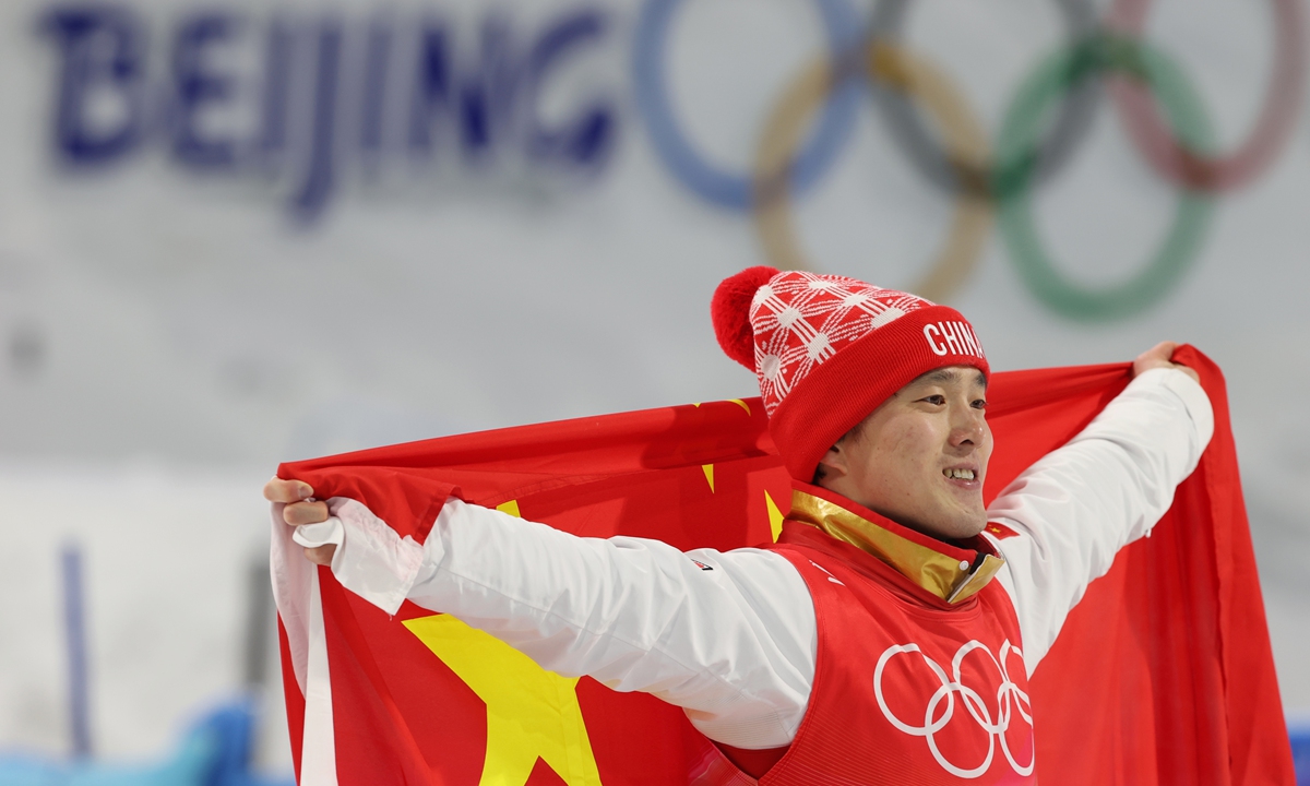 Qi Guangpu celebrates winning gold. Photo: Cui Meng/Global Times