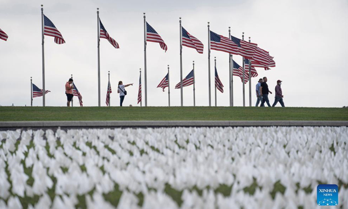 White flags are seen on the National Mall in Washington, D.C., the United States, on September 16, 2021. More than 660,000 white flags were installed here to honor the lives lost to COVID-19 in the United States.Photo:Xinhua