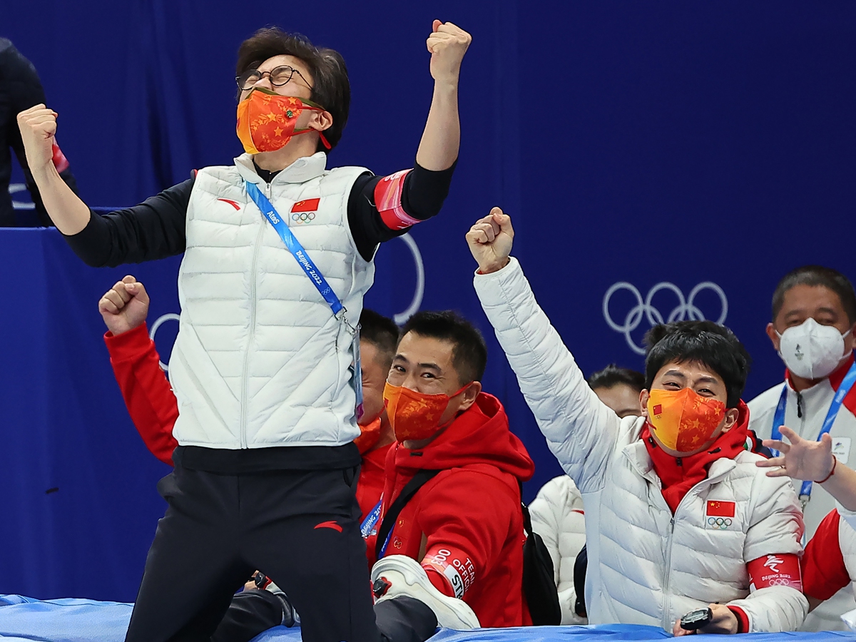 Kim Sun-tae, head coach of the Chinese national short-track speed skating team, celebrates after Team China won the mixed team relay gold at Beijing 2022 on February 5, 2022. Photo: IC