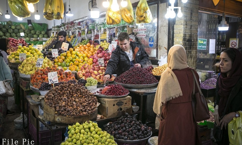 People buy fruit at a bazaar in Tehran, Iran, on Oct. 24, 2019.(Photo: Xinhua)