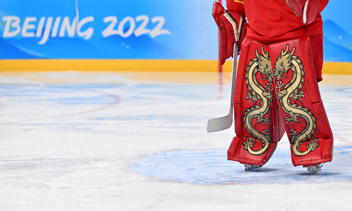 Chinese women's ice hockey team goaltender Zhou Jiaying's leg pads featuring two Chinese dragons Photo: VCG