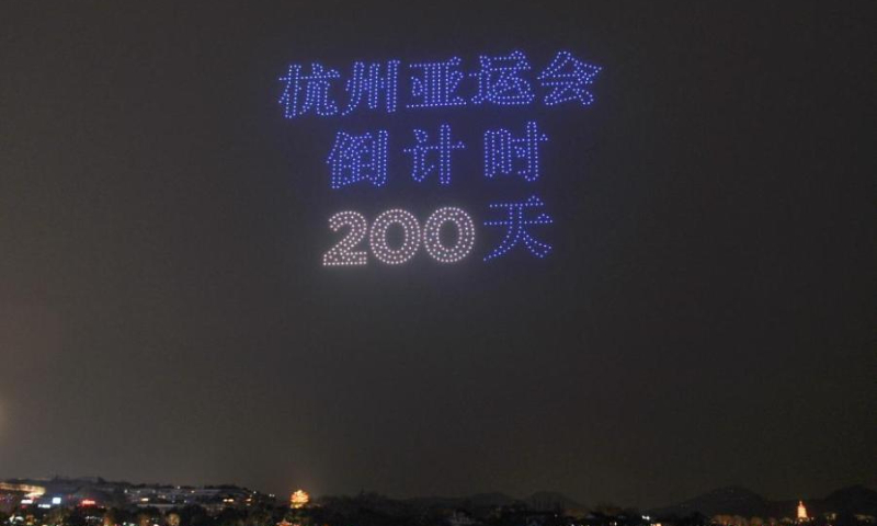 Over 1,000 illuminated drones display Chinese characters of 