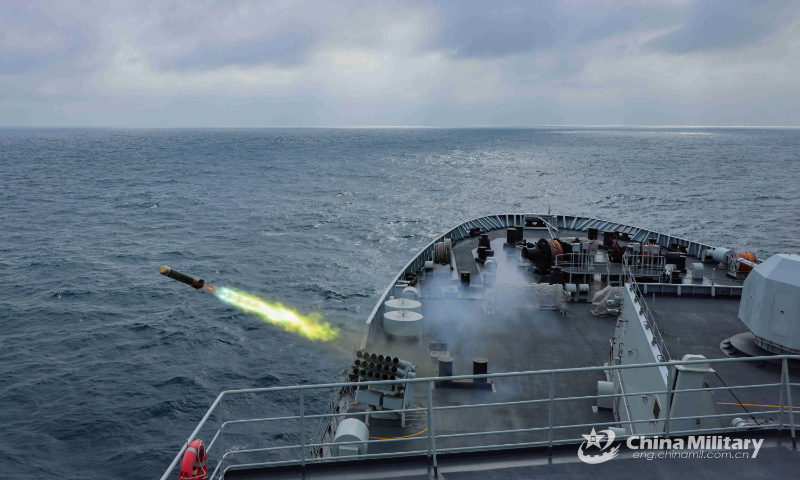 The amphibious dock landing ship Qilianshan (Hull 985) attached to a landing ship flotilla with the navy under the PLA Southern Theater Command releases jamming shells during a recent drill in waters of the South China Sea. (eng.chinamil.com.cn/Photo by Qiao Chenxi)