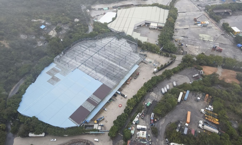 Aerial photo taken on Feb. 22, 2022 shows the construction site of a temporary community isolation and treatment facility, or mobile cabin hospital, for COVID-19 patients in Hung Shui Kiu, south China's Hong Kong.(Photo: Xinhua)