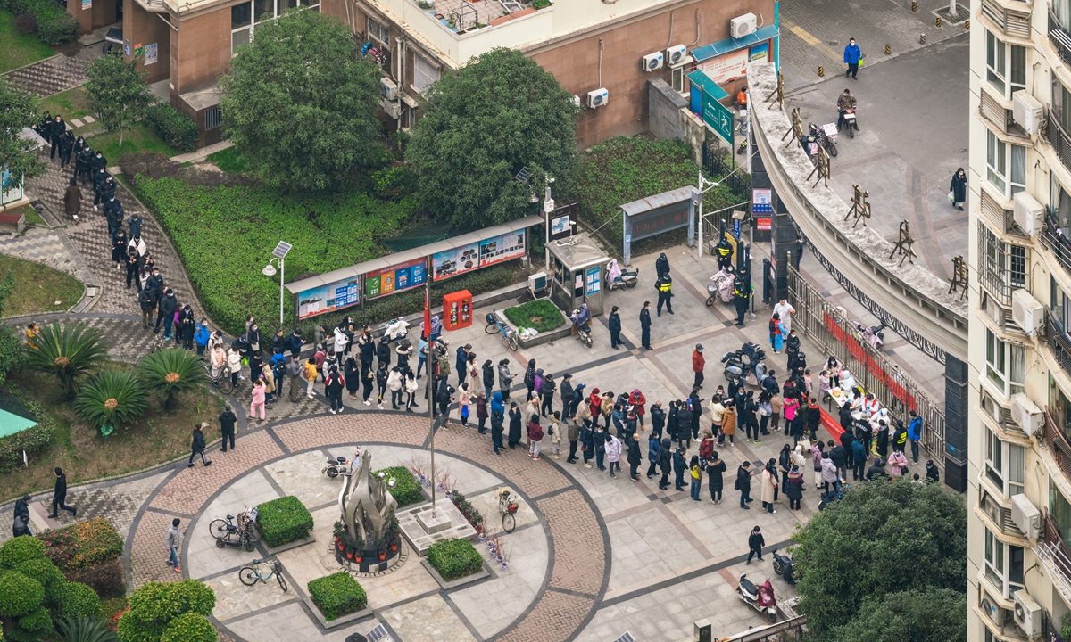 Residents line up for COVID-19 testing in Wuhan, Central China's Hubei Province. Photo: VCG