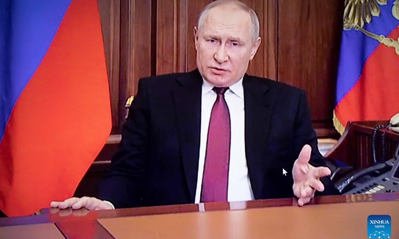 Photo taken on Feb. 24, 2022 shows a screen displaying Russian President Vladimir Putin speaking during a televised address, in Moscow, Russia. Putin on Thursday authorized a special military operation in response to the appeal of the leaders of the republics in the Donbass region. (Xinhua）