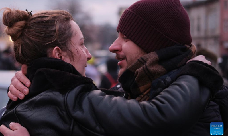 A couple hug with each other at the Przemysl railway station in Przemysl, Poland, Feb. 27, 2022.

Recently, a large number of Ukrainian people arrived in Przemysl by train. (Xinhua/Meng Dingbo)