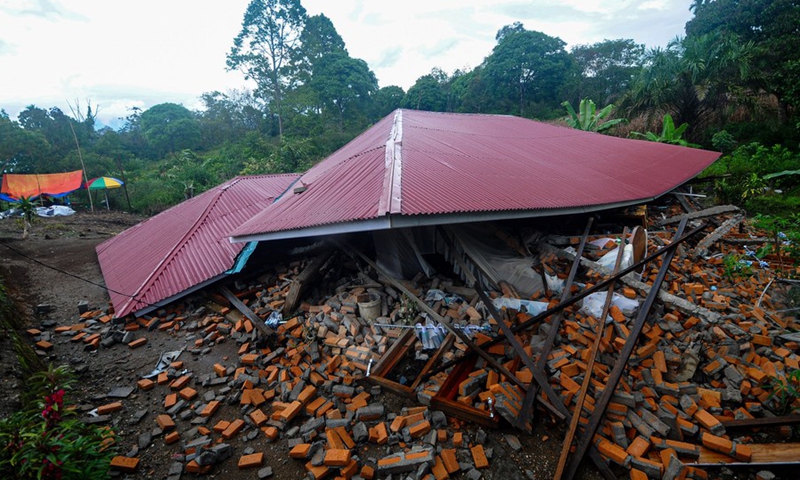 Photo taken on Feb. 25, 2022 shows a damaged house after an earthquake at Talamau village in Pasaman Barat district, West Sumatra, Indonesia.(Photo: Xinhua)