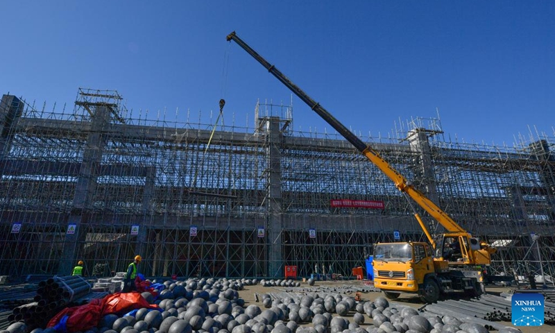 People work at Zhouliang Station of a railway linking Beijing with the Binhai New Area of Tianjin in north China's Tianjin, Feb. 26, 2022. With a length of about 172 kilometers and a designed speed of 350 kilometers per hour, the second intercity express railway linking Beijing with the Binhai New Area of Tianjin is expected to cut travel time between the two areas to 57 minutes. (Xinhua/Sun Fanyue)