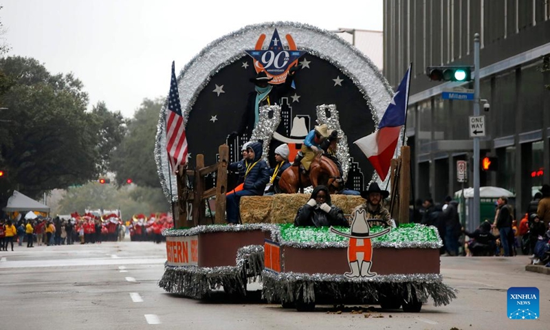 A float marches during the 90th Downtown Rodeo Parade in Houston, Texas, the United States, Feb. 26, 2022. (Photo by Lao Chengyue/Xinhua)