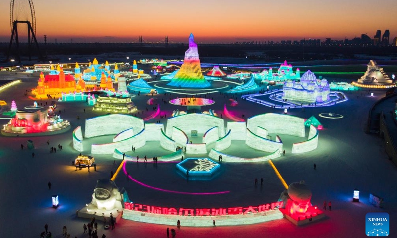 Aerial photo shows tourists visiting the Harbin Ice-Snow World in Harbin, northeast China's Heilongjiang Province, Feb. 27, 2022. The 23rd Harbin Ice-Snow World closed on Sunday. (Xinhua/Zhang Tao)