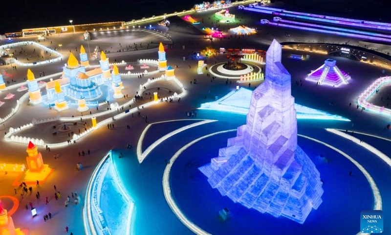 Aerial photo shows tourists visiting the Harbin Ice-Snow World in Harbin, northeast China's Heilongjiang Province, Feb. 27, 2022. The 23rd Harbin Ice-Snow World closed on Sunday. (Xinhua/Xie Jianfei)