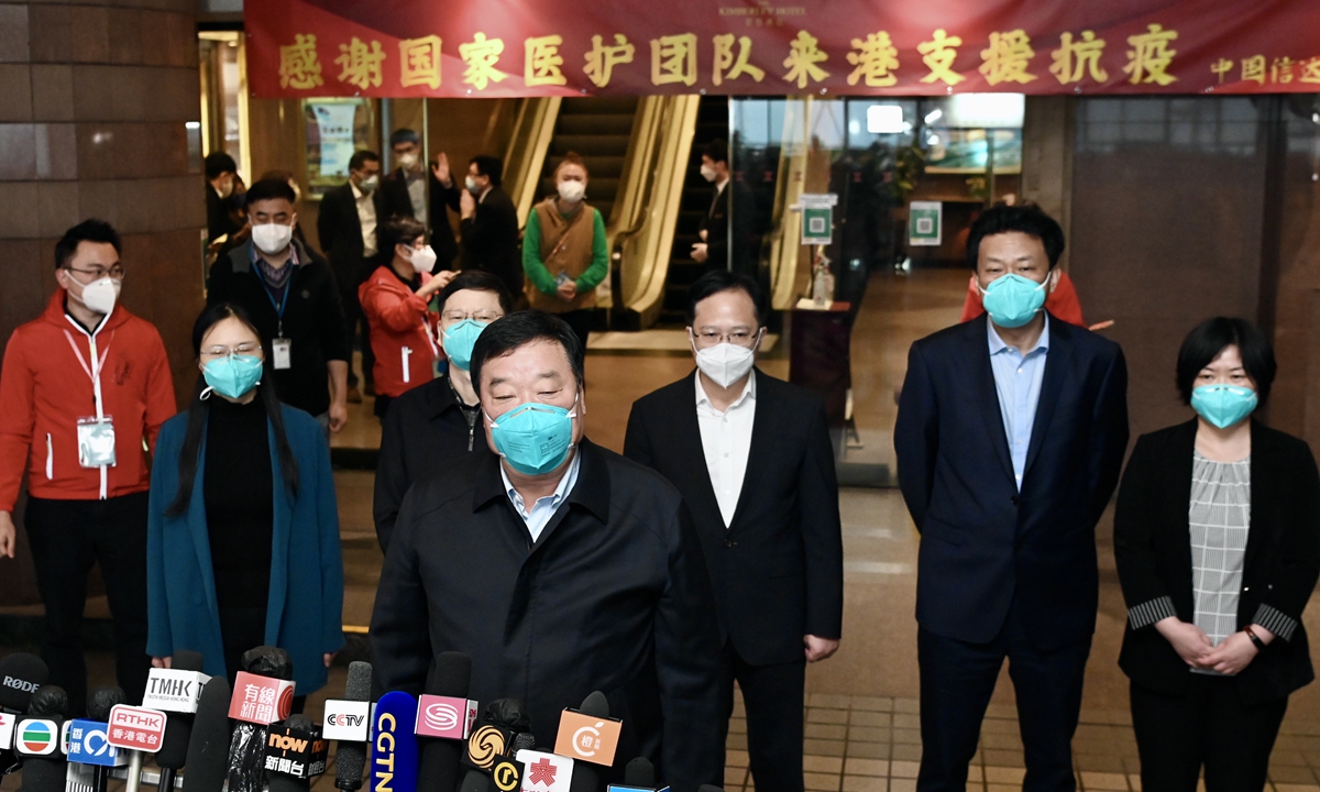 A five-member expert team, the third batch and the highest-level expert team so far dispatched by the Chinese central government, arrive in Hong Kong on February 28, 2022. Photo: VCG 