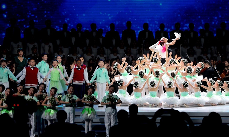 Young artists perform the renowned Chinese folk song Jasmine Flower during a concert on Monday night in Shanghai. Photo: Chen Xia/Global Times
