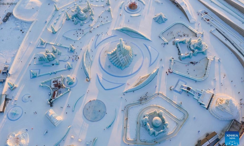 Aerial photo shows tourists visiting the Harbin Ice-Snow World in Harbin, northeast China's Heilongjiang Province, Feb. 27, 2022. The 23rd Harbin Ice-Snow World closed on Sunday. (Xinhua/Xie Jianfei)