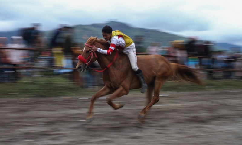 A teenager rides his horse during a traditional horse racing competition at Takengon in Aceh, Indonesia, Feb. 27, 2022.(Photo: Xinhua)