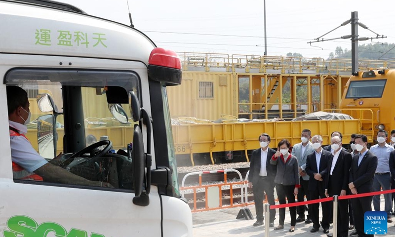 Carrie Lam, chief executive of the Hong Kong Special Administrative Region (HKSAR), welcomes a freight train loaded with anti-COVID-19 supplies in Hong Kong, south China, March 2, 2022.(Photo: Xinhua)