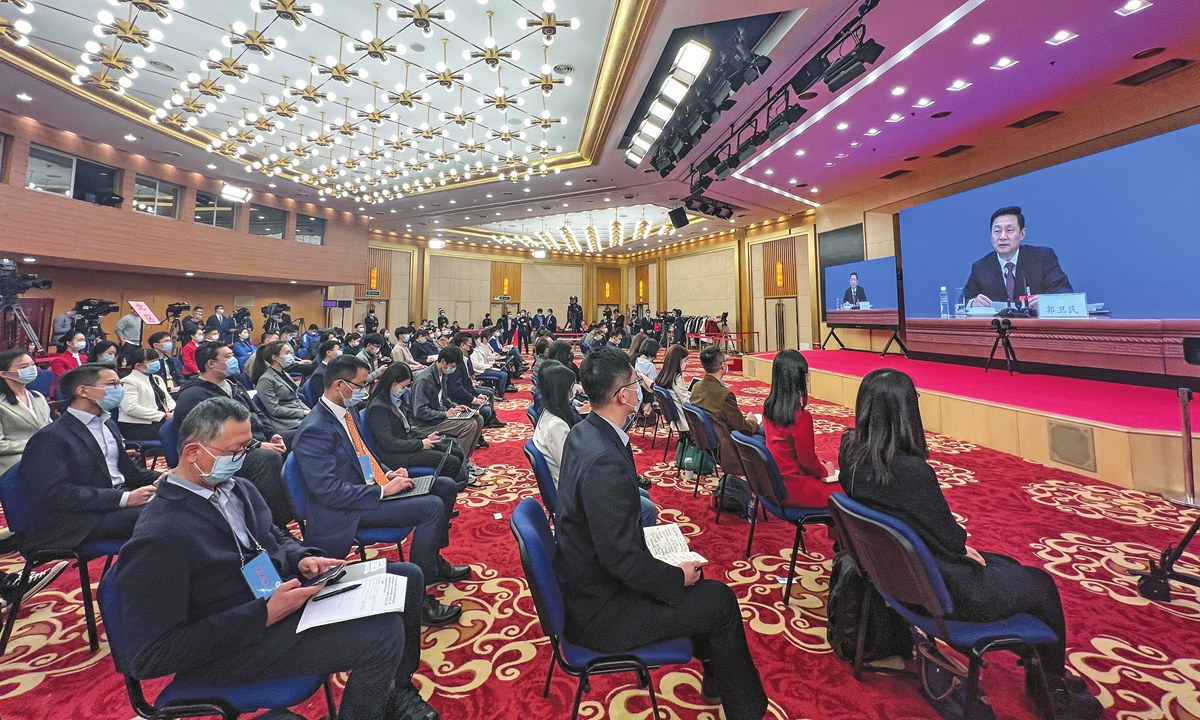 Journalists attend a press conference of the fifth session of the 13th National Committee of the Chinese People's Political Consultative Conference (CPPCC) via video link in Beijing, capital of China, on March 3, 2022. Photo: People's Daily