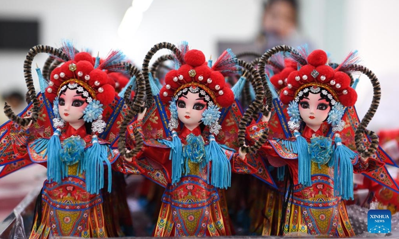 Workers assemble Tang dolls at a workshop in Huishui County of Qiannan Buyi and Miao Autonomous Prefecture, southwest China's Guizhou Province, March 1, 2022.Photo:Xinhua