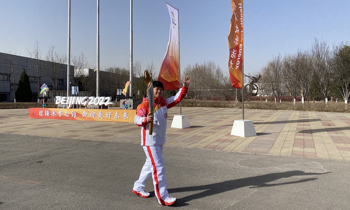 Chinese Paralympic gold medalist Zhou Xia is the first torchbearer for Beijing 2022 Paralympic Winter Games torch relay departing from the China Disabled Sports Management Center in Beijing's Shunyi district on Friday. Photo: Zhang Hui/GT